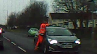 Angry man totally smashes car's windshield