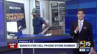 Police are searching for a man who robbed a Phoenix cell phone store