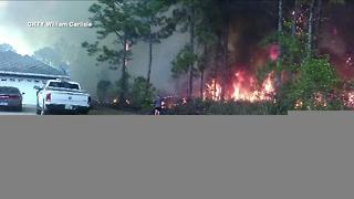 Crews battle large fire at Indian Lake Estates; 800 homes evacuated in Polk Co.