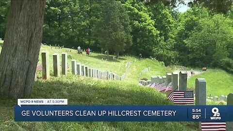 GE volunteers clean up cemetery