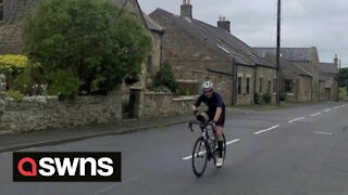 UK dad breaks world record for the LONGEST TRIATHLON