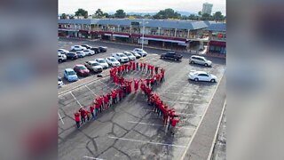 World Aids Day: World’s largest human red ribbon