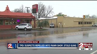 TPD: Suspects repelled into pawn shop, steal guns