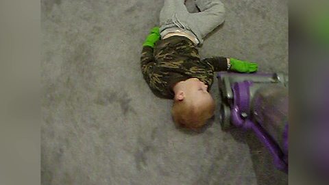 Tot Boy Sleeps Through Vacuuming