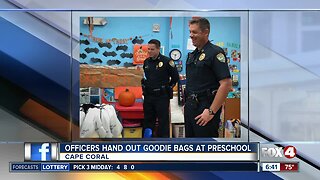 Officers hand out goodie bags at preschool