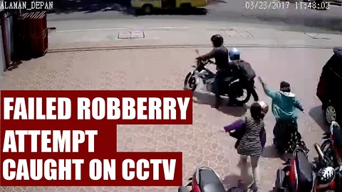 Like Movie Scene - Failed Robbery Attempt Caught on CCTV