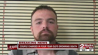 Couple charged in four-year-old's drowning death