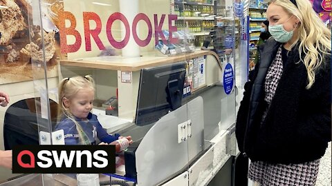 Four-year-old Tesco super-fan is given a custom-made uniform and even offered a shift at the tills