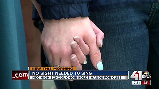 High school choir joins hands to help classmate who's blind