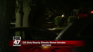 Police say deputy fatally shot intruder at her Detroit home