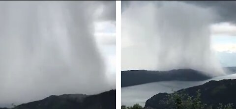 Clouds dump water in lake