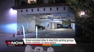 Driver arrested after UHaul collides with hotel parking garage