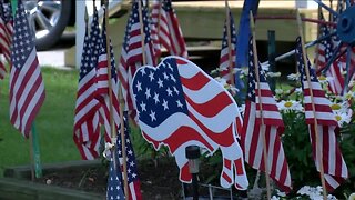 "Flag man" decides to decorate his lawn for the last time
