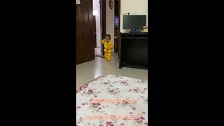 Cute baby talking on phone and enjoying