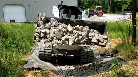 PART 2 of 3 Bobcat T650 MTL installing rip rap ditch to control hillside water erosion Illinois farm