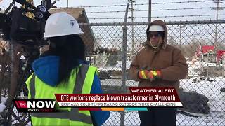 DTE workers repair blown transformer in bitter cold