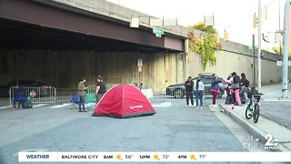 Homeless activists protest removal of encampment near Baltimore Farmers' Market
