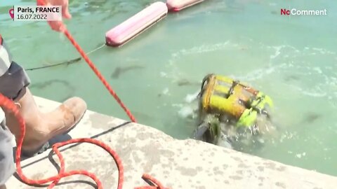 Workers clean up Paris canal, retrieve bikes and flat-screen TV