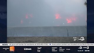 Video shows a structure on fire in Superior from wildfire