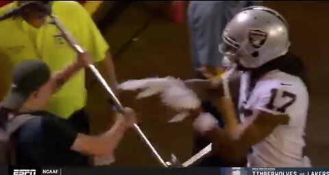 Davante Adams shoves cameraman down after Raiders lose to Chiefs.