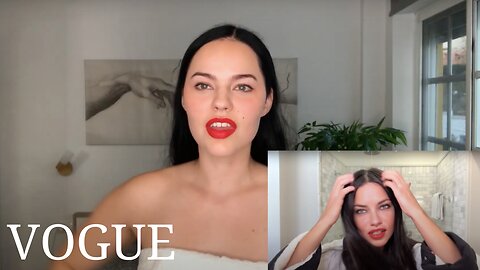 Elli Adalmina following Adriana Lima's VOGUE makeup tutorial