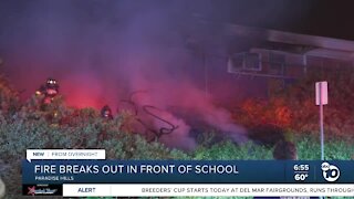 Fire erupts in front of school in Paradise Hills