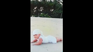 Little guy happy alone in beach