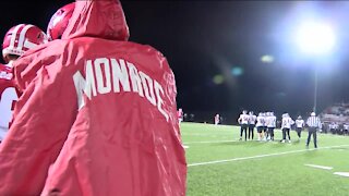 Football fans tough it out following first snowfall