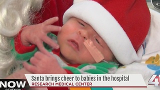 Santa brings cheer to babies in the hospital