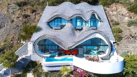 Casa Futurista com ARQUITETURA de Linhas Sinuosas e DESIGN DE INTERIORES Incrível