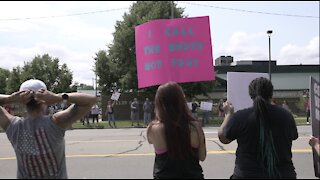 'Hundreds' gather at protest against Henry Ford Health vaccine mandate