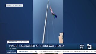 Pride flag raised at Stonewall rally