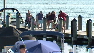 Visitors from locked-down Illinois travel across the border to busy Lake Geneva