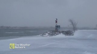 Blowing snow on the icy shores of Sault Ste. Marie