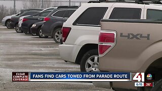 Fans find cars towed from parade route