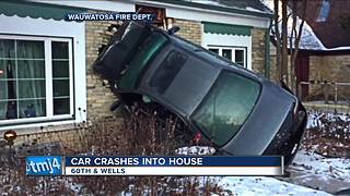 Car crashes into home in Wauwatosa