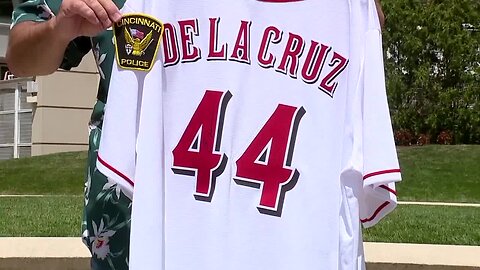 Cincinnati officers get signed Elly De La Cruz jersey for officer shot in brand new Reds jersey