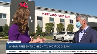 WMAR-2 Presents Check to Md. Food Bank