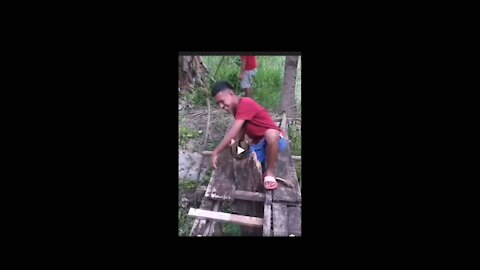 Funnyvideo must watch man crossing bridge watch to see what happens