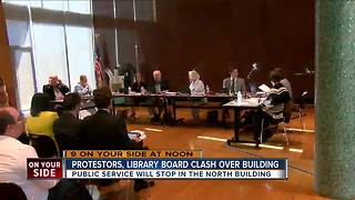 Protesters, library board clash over building