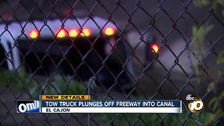 Tow truck plunges off freeway into canal