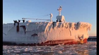 Huge fishing vessel covered in ice docks in Minnesota