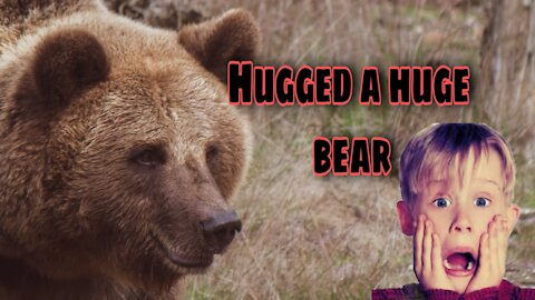 Brave Russian, hugging with a huge bear 😧