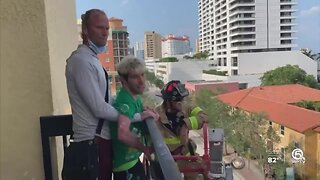 West Palm Beach firefighters surprise man with cerebral palsy
