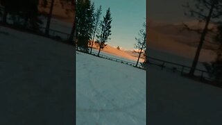 First light through snow road