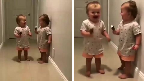 Twin toddler found a unique way to laugh