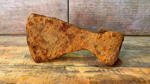 Restoration of an Ancient and Very Rusty battle axe.