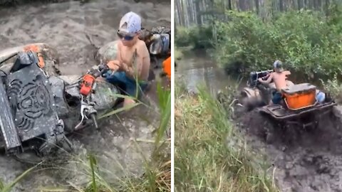 Kid miraculously drives ATV out of muddy disaster