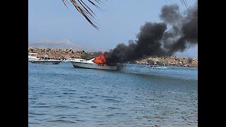 Burning boat beach