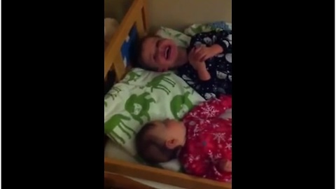 Little boy sends baby brother into laughing fit